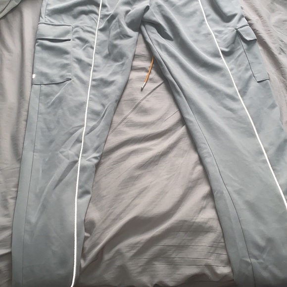 I have some grey EPTM pants they are reflective. Brand new never worn! Size XXL. - Picture 4 of 6